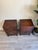 Pair of Asian inspired design wooden bedside tables. These are great practical units each including two smooth sliding...
