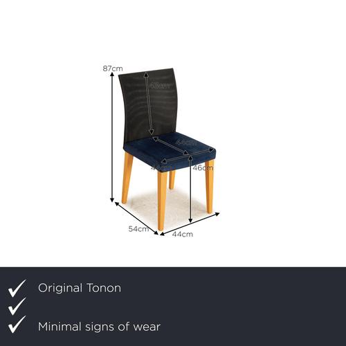 The Tonon chair set is covered in a blue fabric and stands on wooden feet. I have official proof of authenticity such as...