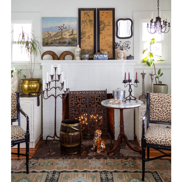 This small but mighty antique bevelled mirror features a thick, wavy, bentwood mahogany frame that is shaped like a piece...