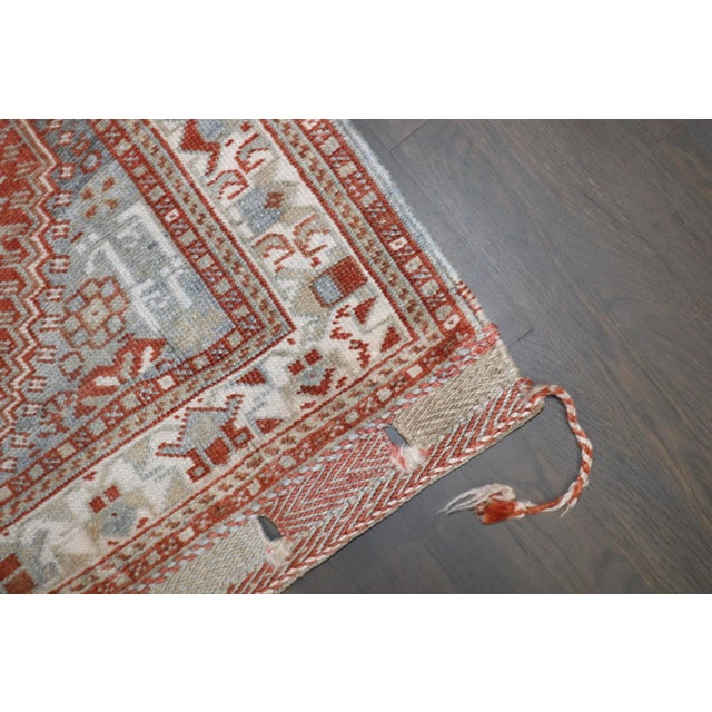 an early 20th Century Persian Bagface Rug