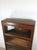 This antique barrister bookcase by Gunn Bookcase Company features hardwood construction, mahogany veneer with original...