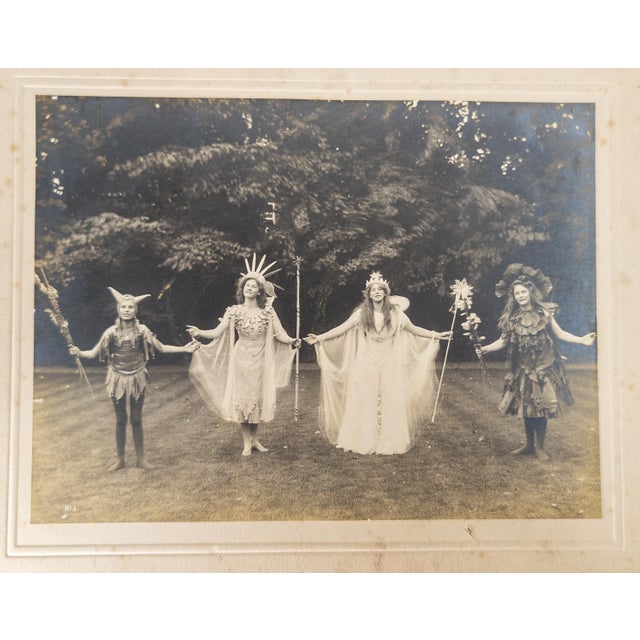 We are selling this great early 20th century Edwardian photo of girls in costume. This photo appears to be of a play or...