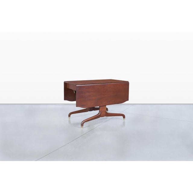 Beautifully mid-century drop-leaf dining table crafted by Extensole Corporation of Sparta, Michigan, circa 1960. Known for...