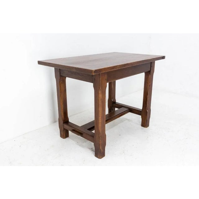 French side table or small dining table in massive oak. Mid-century, circa 1970. Dimension between the floor and the table...