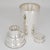 Silversmith Asprey, London, designed this stunning Art Deco silver plate cocktail or Martini shaker. The cylindrical piece...