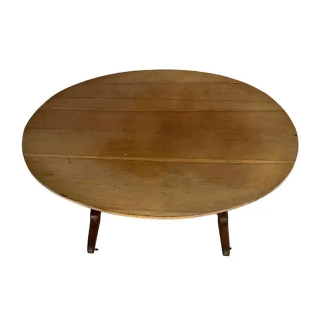 Large 19th century Tilt-top French wine tasting table. The top can be positioned vertically for storage and opened for use...