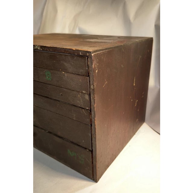 This listing is for a really interesting antique watchmaker’s cabinet. It is made from wood and has 6 wooden drawers. It...