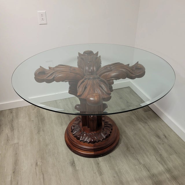 This stunning Italian round pedestal dining or center table from the 1950s showcases masterful craftsmanship in richly...