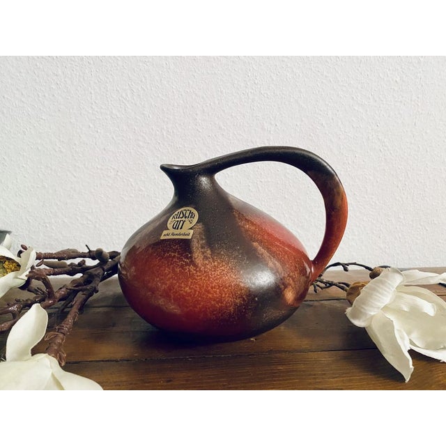 German Ceramic Vase by Kurt Tschörner for Ruscha, 1960s, in Very Good conditions. Designed 1950 to 1959 This piece has an...