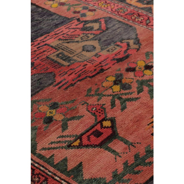 This vintage 5x9 Turkish rug is a remarkable hand-knotted wool weaving dating to circa 1950–1960. The piece features...