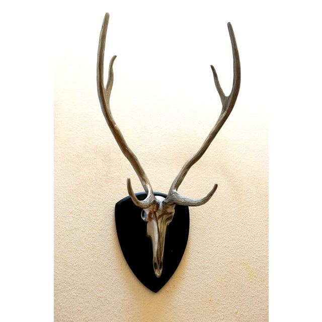 A vintage cast metal antelope skull wall ornamentfrom is ready for installation. It is from the second half of the 20th...