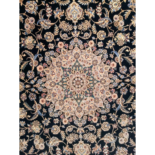 "An exceptional mid-20th century Persian Nain rug showcasing one of the finest examples of this celebrated city's weaving...
