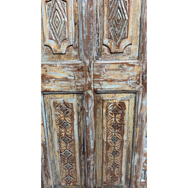 Bring character and timeless charm to your home with this vintage carved wood single door, finished in a beautifully...