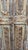 Bring character and timeless charm to your home with this vintage carved wood single door, finished in a beautifully...