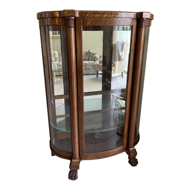 Antique Curved Glass Mirrored Back Curio Cabinet on Claw Feet For Sale