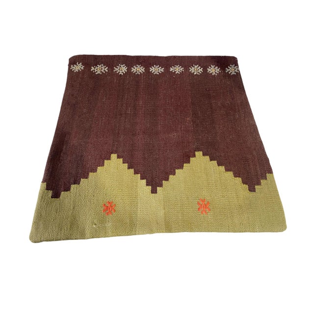 This exquisite Turkish Tribal Persian Kilim rug pillow is hand woven with vibrant colors and intricate geometric patterns....