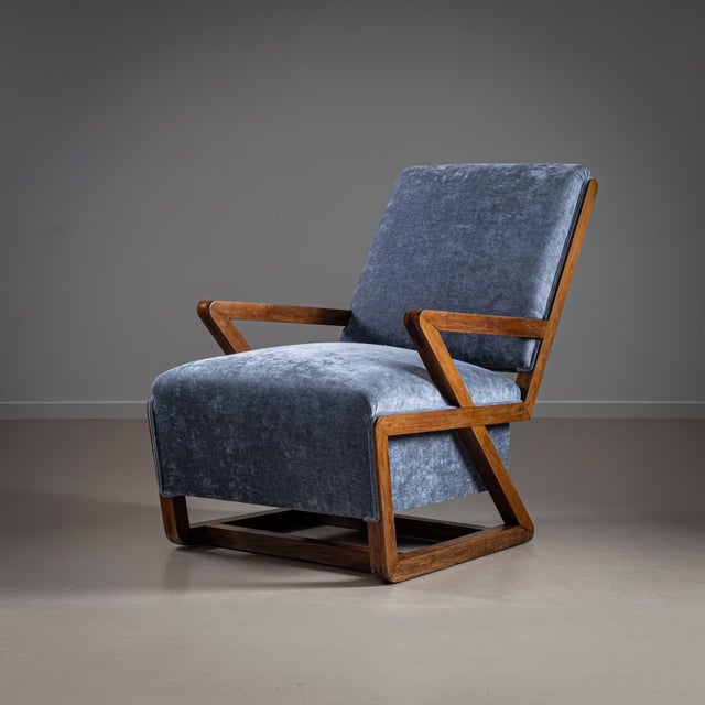Two lounge chairs with gray velvet upholstery and geometric frame made of solid walnut. Armchairs newly upholstered and...