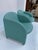Clean and slim-lined 1980s club chairs, upholstered in turquoise vinyl. Very similiar to the "Ben chair" by Pierre Paulin,...