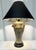 Illuminate your space with the striking Vintage Mid-Century Modern Hollywood Regency Three-Sided Elephant Table Lamp...