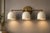 Handcrafted Solid Brass 3-Light Wall Sconce, Antique Brass Vanity Light With White Shades For Sale - Image 4 of 8