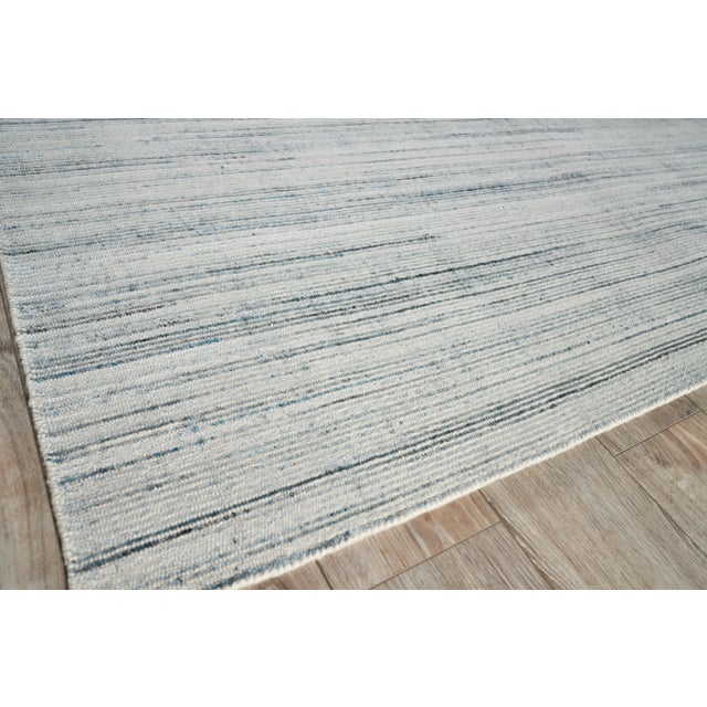 By using contrasting multi-color in this subtle striped pattern, the subdued pops of the accent colors give a nice twist...