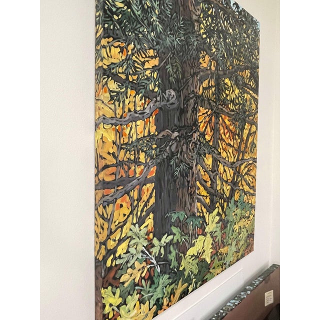 This artwork captures the essence of autumn through a vibrant depiction of a mother tree surrounded by a rich tapestry of...