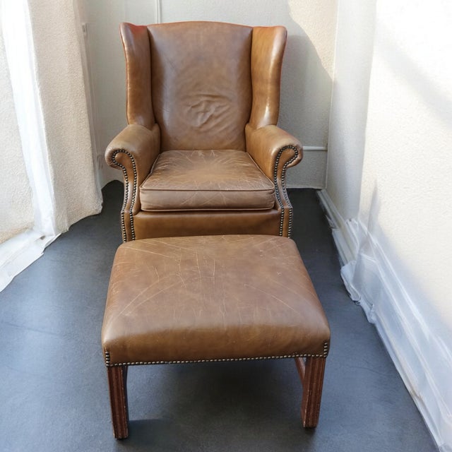 Experience Timeless Comfort with Classic Leather Introducing the epitome of refined living: a stunning wingback armchair...