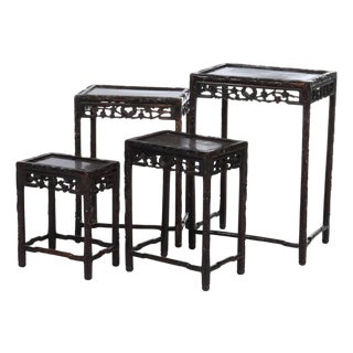 Set of 4 Antique Chinese Floral & Figural Carved Hardwood Nesting Tables For Sale