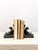 Bring vintage charm and character to your bookshelf or desk with this pair of cast metal bookends featuring a sleeping man...