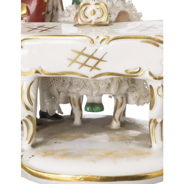 Porcelain - Musicians. European porcelain sculptural group; early 20th century. Polychrome gilded decoration in relief....