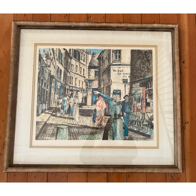 Joyful, colorful Parisian Street Scene Lithograph by French artist Etienne Julia. Buildings outlined by shades of blue...