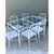 Exemplifying the height of mid-century resort luxury, this authentic vintage "Calcutta" dining table by Brown Jordan...