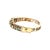 A mid-century Victorian revival 14k gold hinged bracelet with opal cabochons. This piece features intricate filigree work...