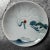 Beautifully decorated Japanese porcelain plates featuring an image of a crane in a mountain landscape with pine trees. The...