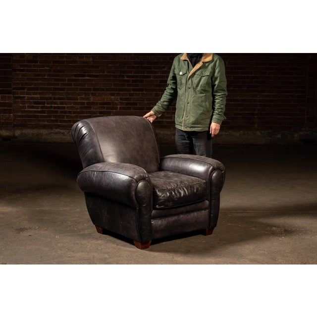 2000s; Klaussner Furniture Industries - Asheboro, NC Substantial lounge armchair upholstered in black leather, built with...