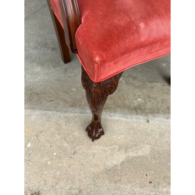 Kindel Furniture of Grand Rapids mahogany chippendale arm chair. Ball and claw feet , carved back . Measures 24” w x 23” d...