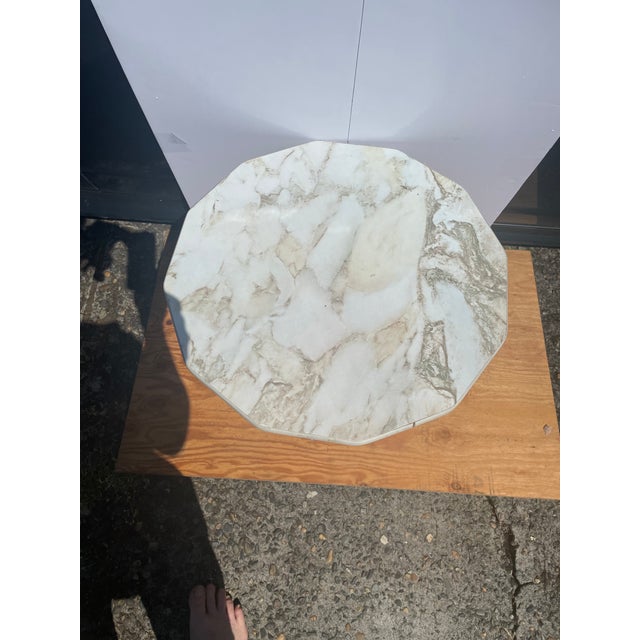 Here we have a nice mid-century faux marble cherub accent table made of plaster and wood. Great for the home or garden....