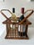 Vintage, tortoise bamboo wine bottle holder with handles. Nice coastal addition for entertaing. Excellent vintage condition.