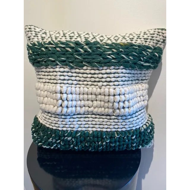 This textured striped pillow makes the perfect accent to any sofa or bed. The pillow is abundantly stuff making this green...