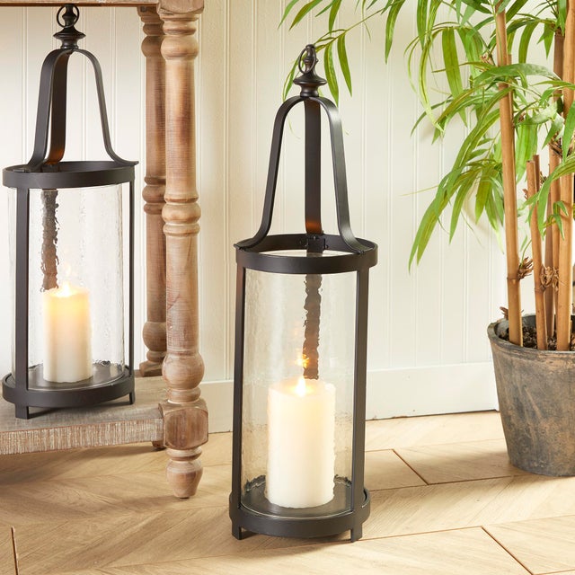 Traditional in form with a tall & narrow profile, this hurricane is at home in a casual space. With a clever hinged...