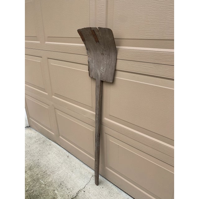 A beautiful antique rustic, farmhouse, or country wooden hand made grain shovel. This would be ideal for an installation...