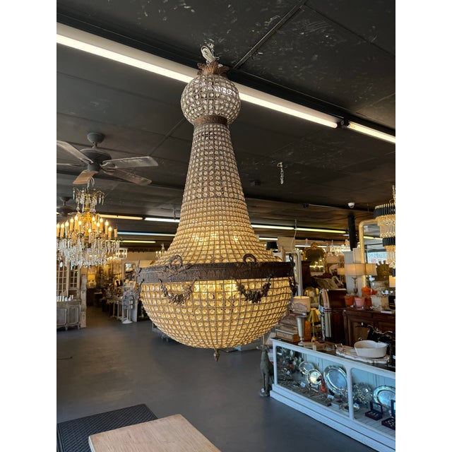 This is a monumental French crystal chandelier, crafted in the classic balloon form that was especially popular in the...