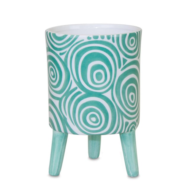 Elevate your plant display with the Blue Patterned Pot with Legs set. Crafted from durable dolomite, these decorative mini...