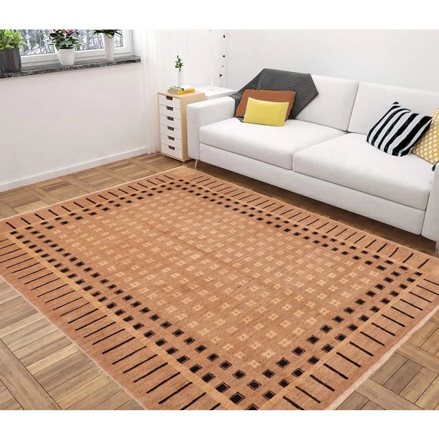 "Enhance the ambiance of your home with this magnificent Persian-influenced Turkish hand-knotted rug made by skilled...