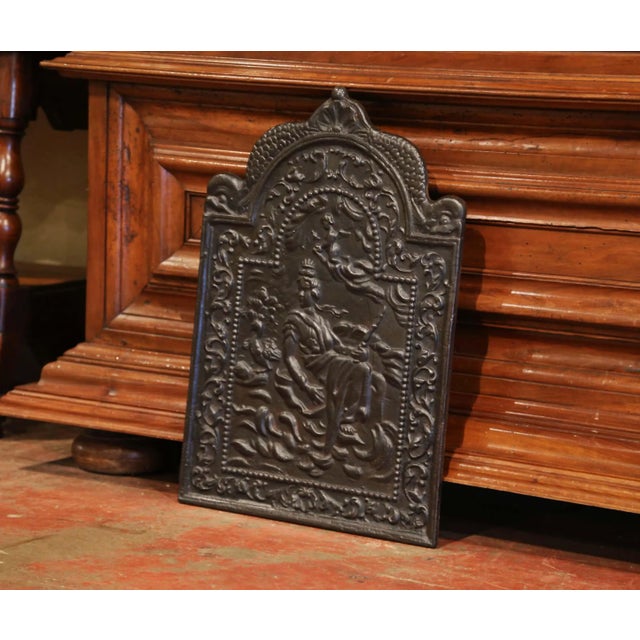 Use this fireback to decorate your fireplace or your stove in the kitchen. Crafted in France, circa 1860, the embellished,...