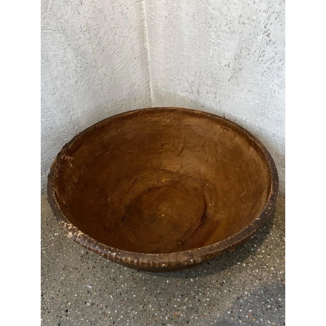 The scale of this papermache’ bowl is unusual and spectacular. The color, stitching and scale make this an object d’ art....