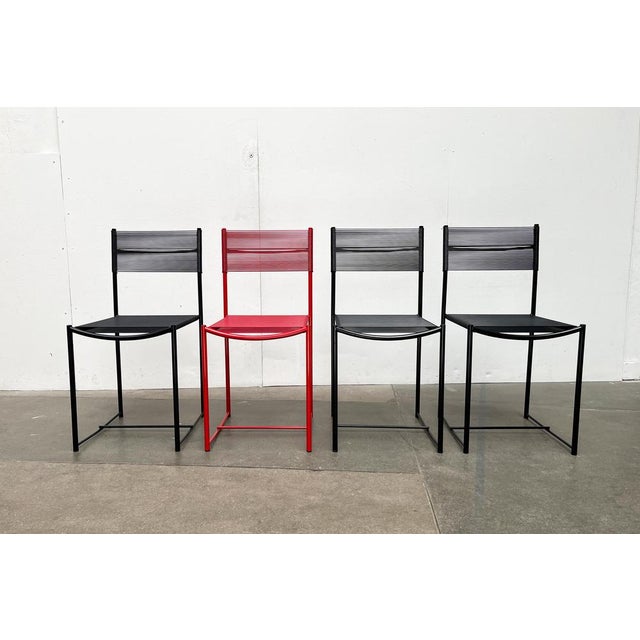 Four postmodern Spaghetti chairs from the Italian manufacturer alias according to a draft by Giandomenico Belotti from the...