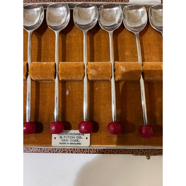 Great Art Deco set of 8 silverplated cocktail or muddler spoons. Made by Abercrombie & Fitch in England. Each spoon has a...