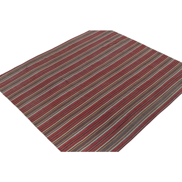 This vintage 8x8 Persian kilim is a tribal rug in the panel-woven style— handwoven in wool circa 1950-1960. Further on the...