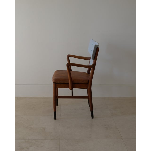 Rare variation of the 1950s Peter Hvidt and Orla Molgaard-Nielsen Portex armchair manufactured by Porter, Denmark....